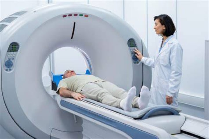 Do I have to undress for a CT scan?