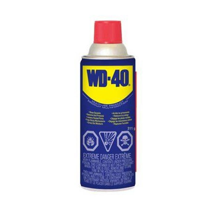 Does WD-40 remove paint from brick?