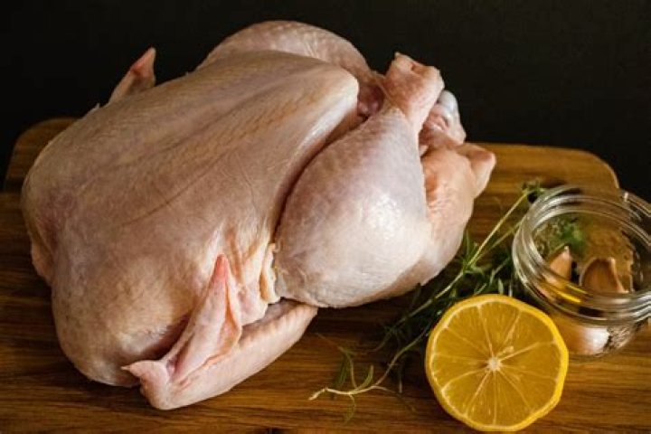 How do you prepare chicken before cooking?