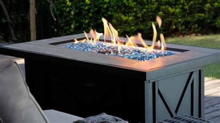 What do you put under a propane fire pit?