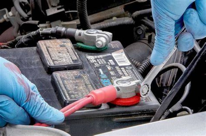 Why does my car battery spark when I connect it?